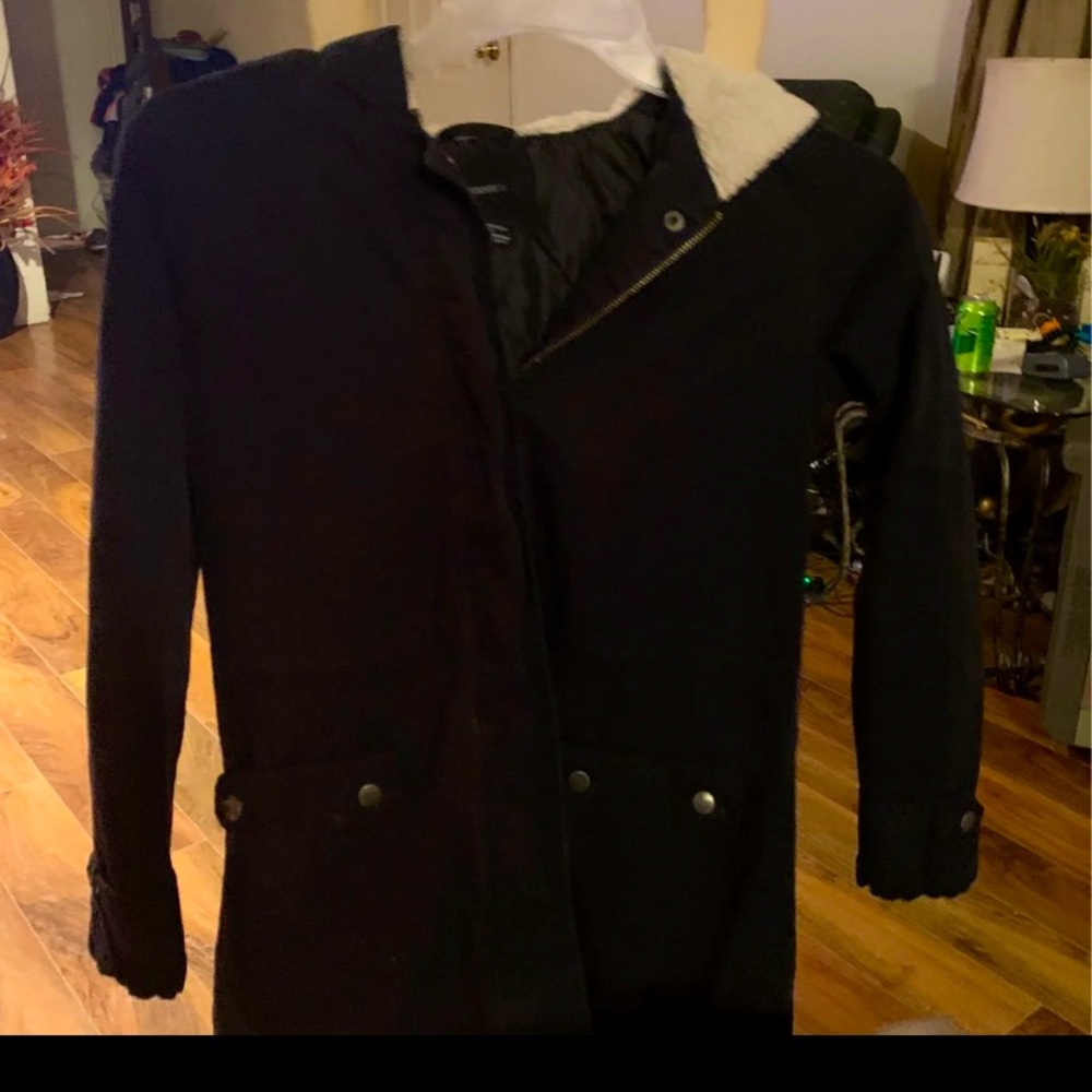 Black jacket with white fur hood